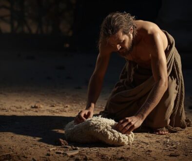 Photorealistic image of the biblical Gideon putting out a fleece